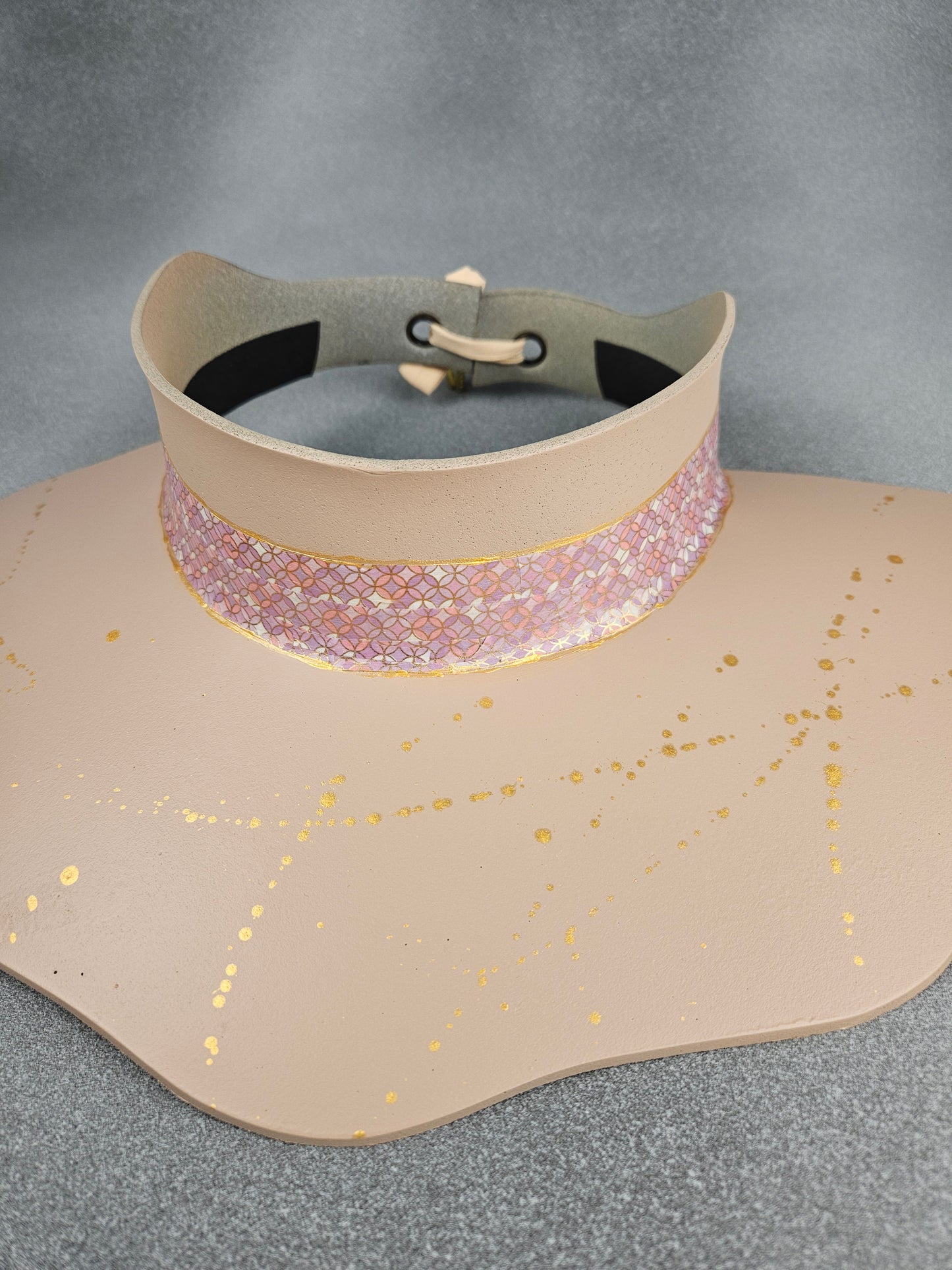 Peachy Beige Lotus Sun Visor Hat with Shimmery Light Pink Geometric Band and Gold Paint Splatter Effect